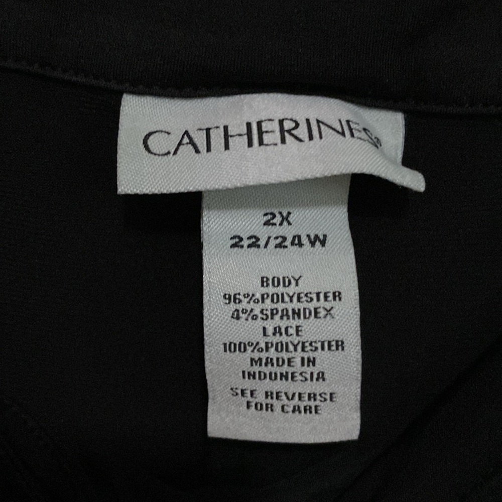 4/$20 black Catherine’s top with white floral detail on sleeves - Picture 3 of 4